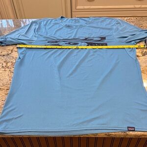Patagonia Men’s Short-Sleeve Performance Tee in Sky Blue with Logo.